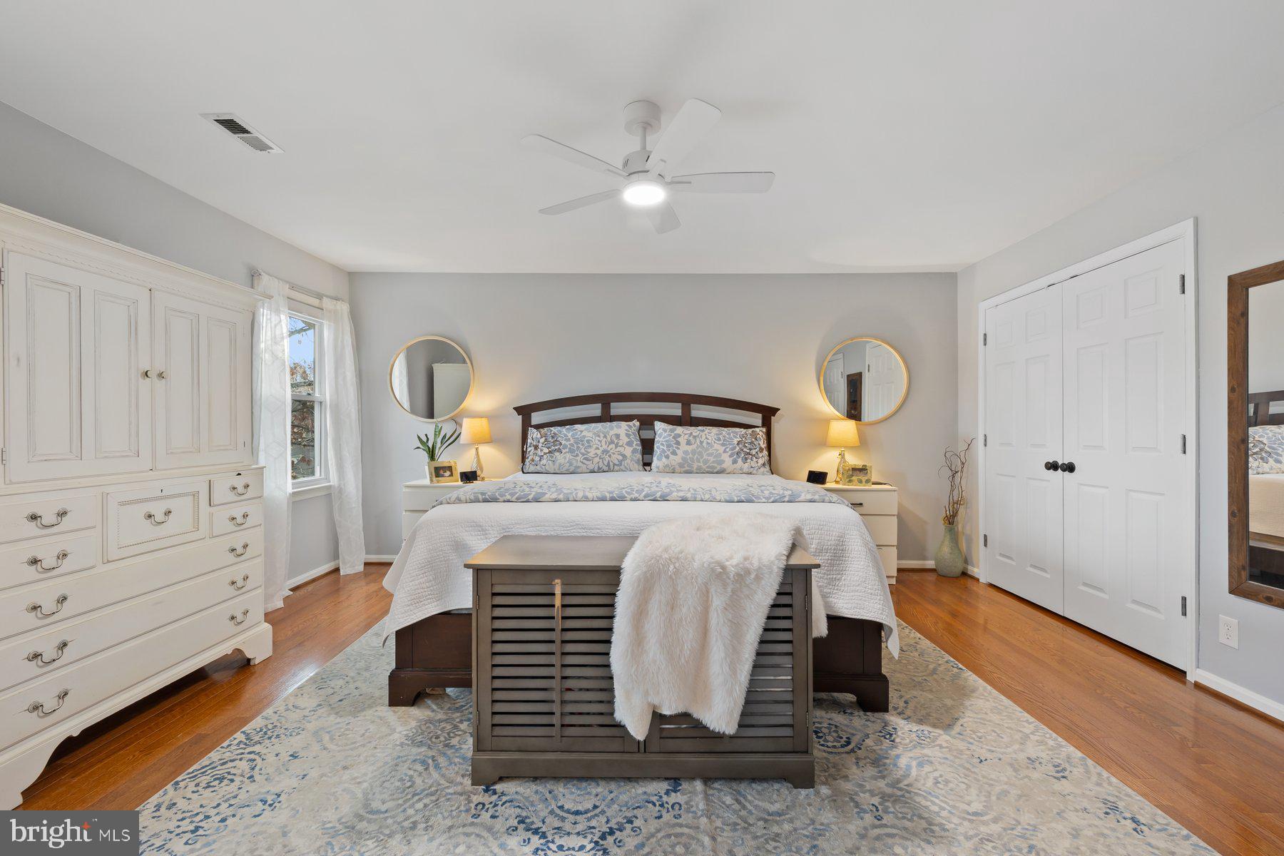 15 Tarleton Way Stafford, VA 22554 - Photo 45 of 74 a bedroom with a bed and wooden floor