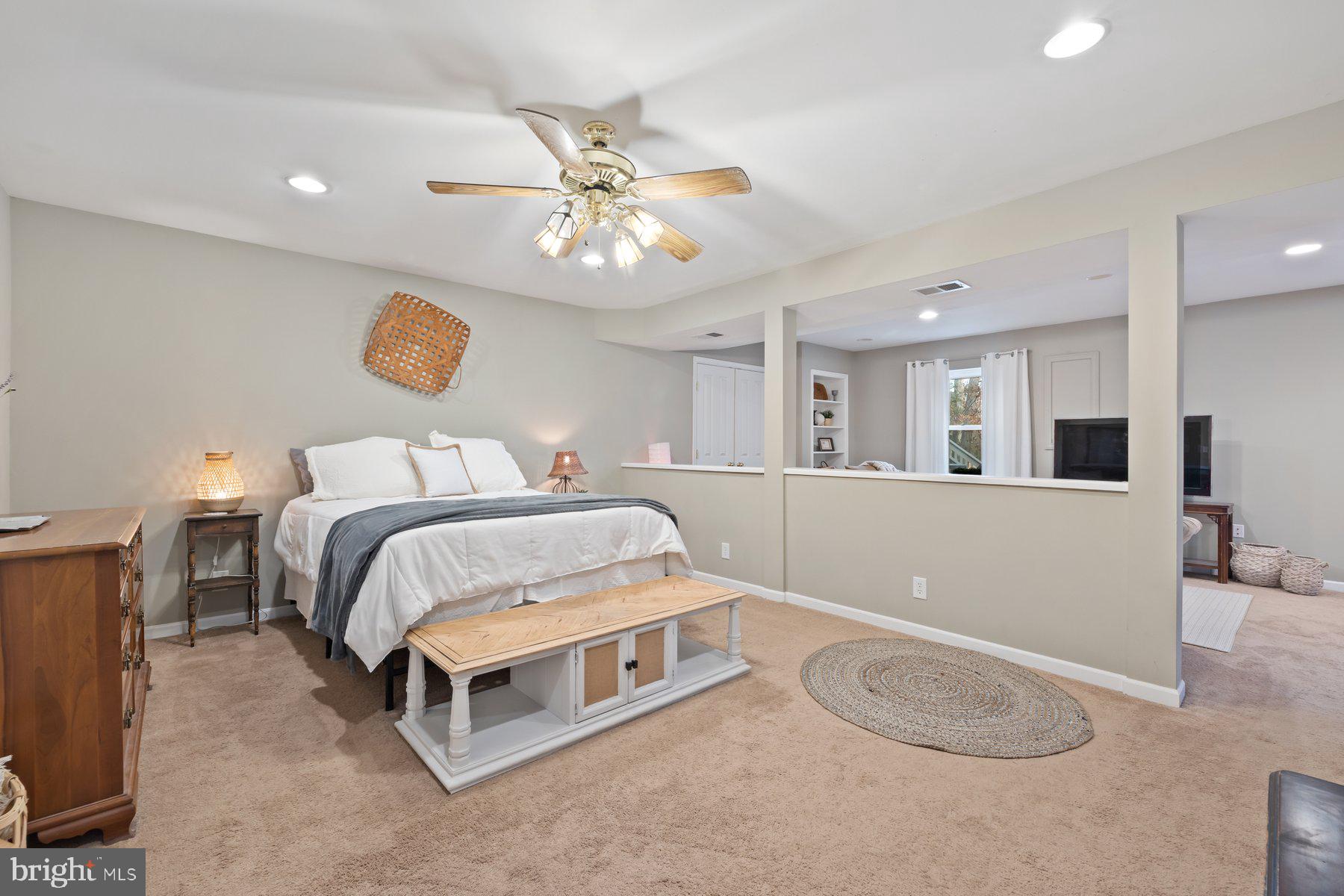 15 Tarleton Way Stafford, VA 22554 - Photo 70 of 74 a bedroom with a bed and a chandelier