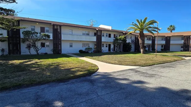 a view of a house with a swimming pool