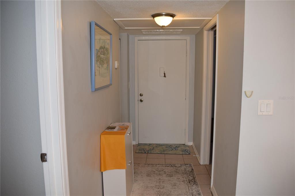 245 Center Road, Unit 104 Venice, FL 34285 - Photo 13 of 37 a bathroom with a sink and a mirror