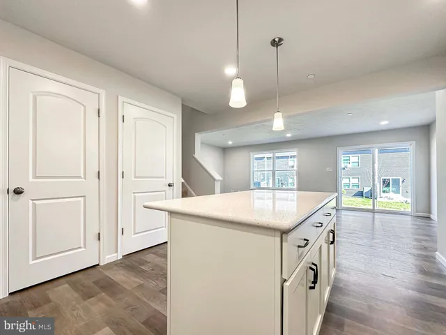 a view of staircase with white walls