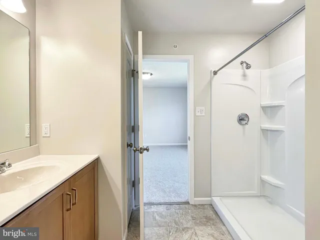 a view of a room with racks on the wall