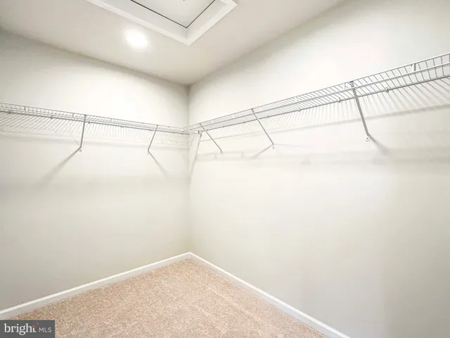 a view of a bathroom with a glass shower door