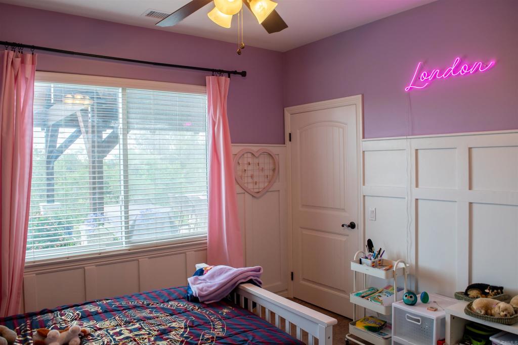 2521 Ralls Street Fallbrook, CA 92028 - Photo 19 of 43 a bedroom with furniture and a window