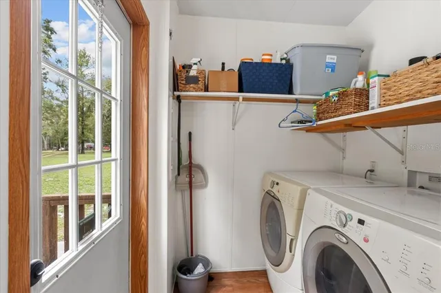 a utility room with dryer and washer