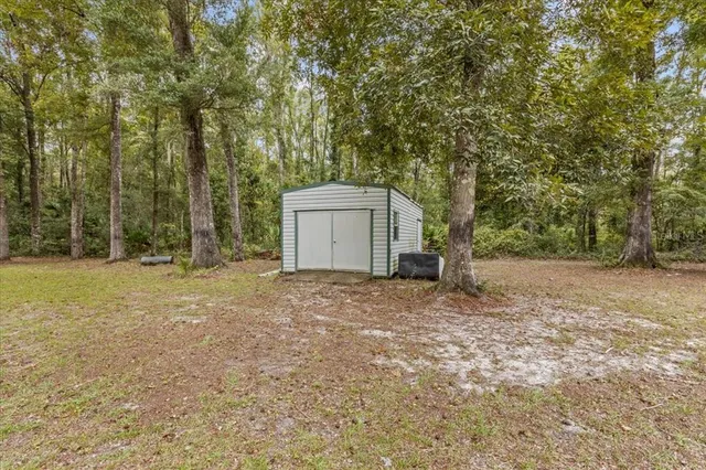 a house with trees in front of it
