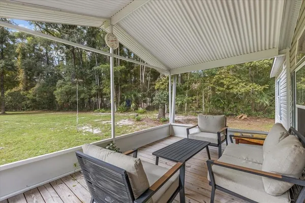 a view of a patio with a yard
