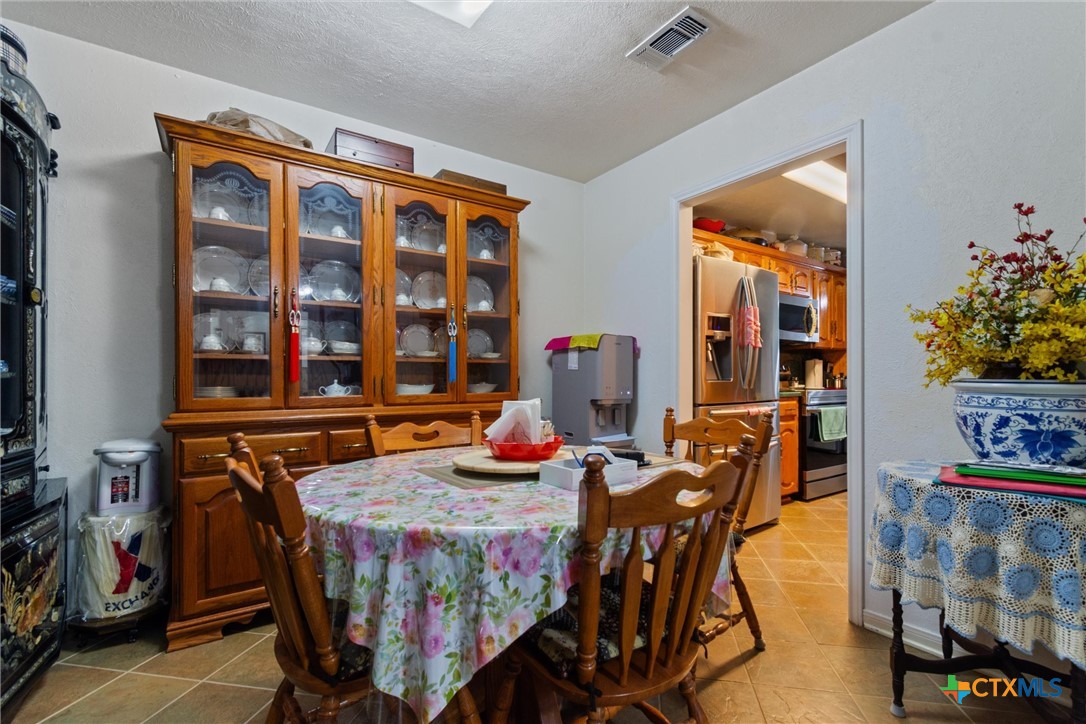 3037 Boys Ranch Road Kempner, TX 76539 - Photo 14 of 47 a dining room with furniture and window