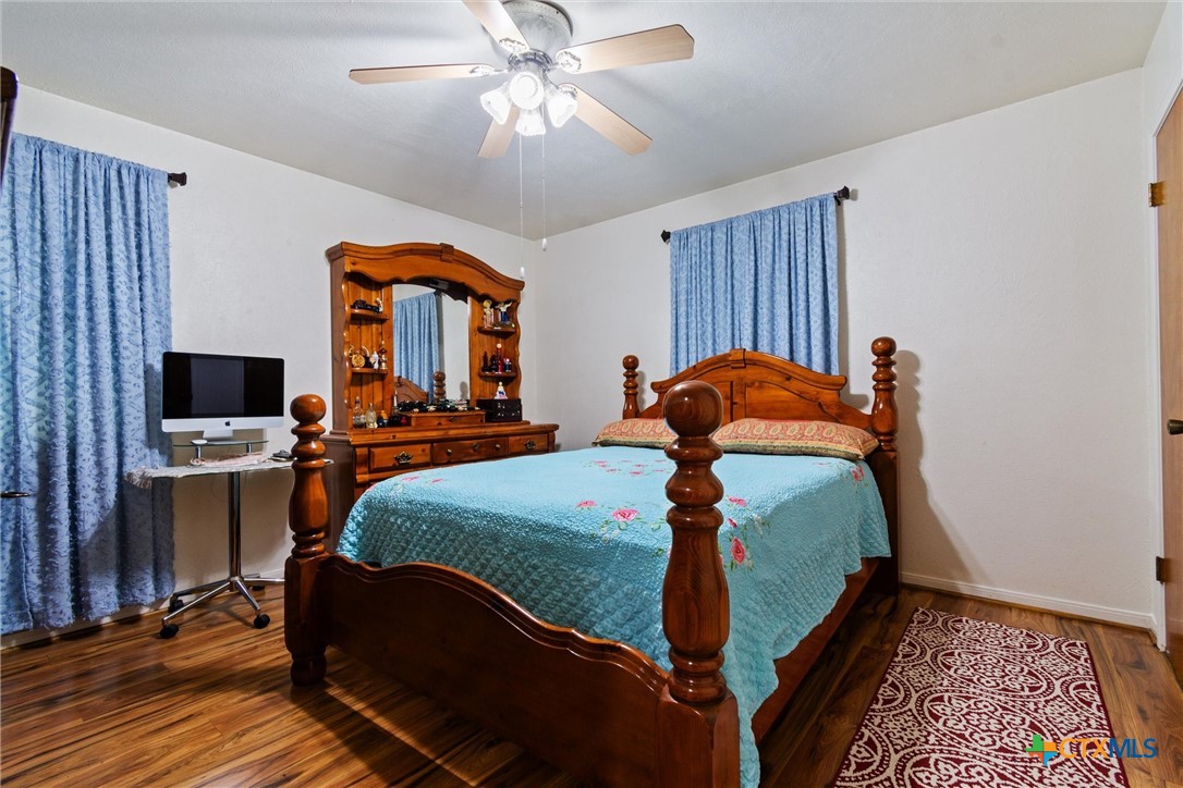 3037 Boys Ranch Road Kempner, TX 76539 - Photo 20 of 47 a bed room with a bed and a tv