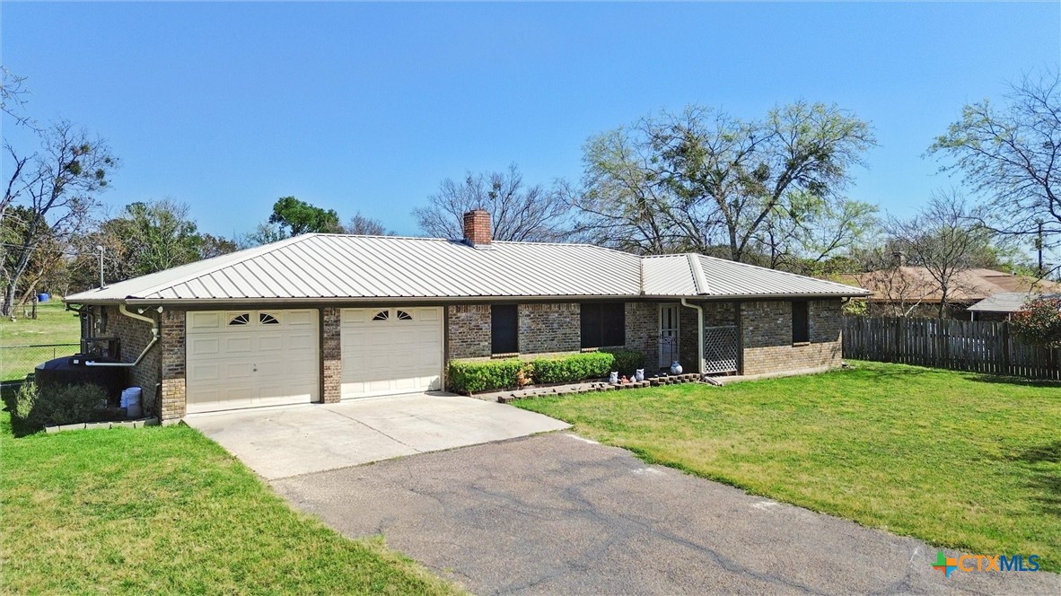 3037 Boys Ranch Road Kempner, TX 76539 - Photo 2 of 47 a house view with a garden space
