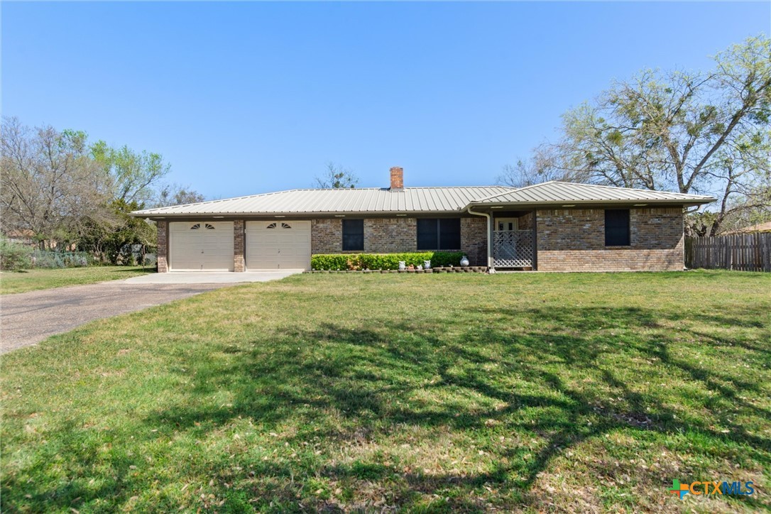 3037 Boys Ranch Road Kempner, TX 76539 - Photo 3 of 47 a front view of a house with garden