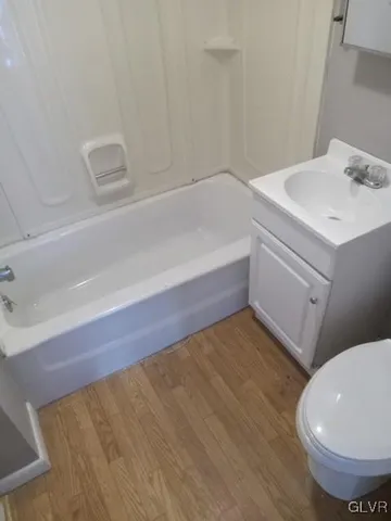 a bathroom with a sink and a vanity