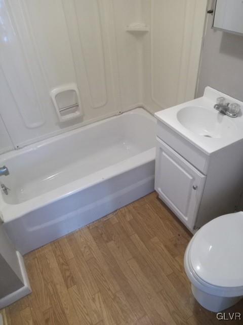 900 Mahantongo Street, Unit 7 Pottsville, PA 17901 - Photo 2 of 5 a bathroom with a sink and a vanity