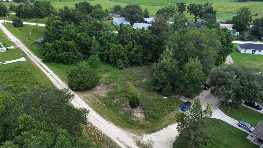 Southwest 32nd Place Ocala, FL 34481 - Photo 3 of 7 an aerial view of residential houses with outdoor space and trees