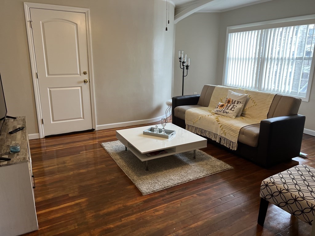 63 Brow Street Fall River, MA 02721 - Photo 19 of 35 a living room with furniture and a window