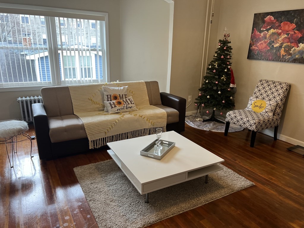 63 Brow Street Fall River, MA 02721 - Photo 20 of 35 a living room with furniture and a large window
