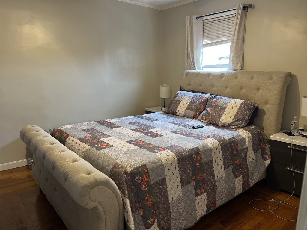 63 Brow Street Fall River, MA 02721 - Photo 27 of 35 a bedroom with a bed and window