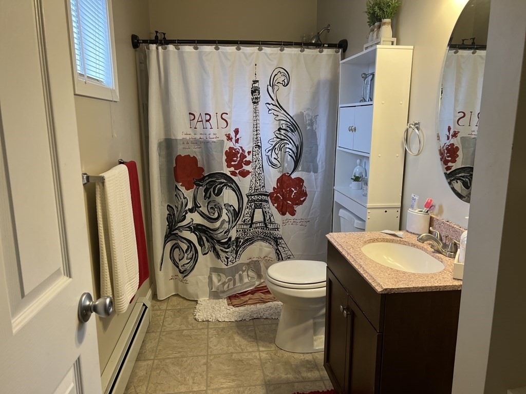 63 Brow Street Fall River, MA 02721 - Photo 29 of 35 a bathroom with a sink toilet and shower