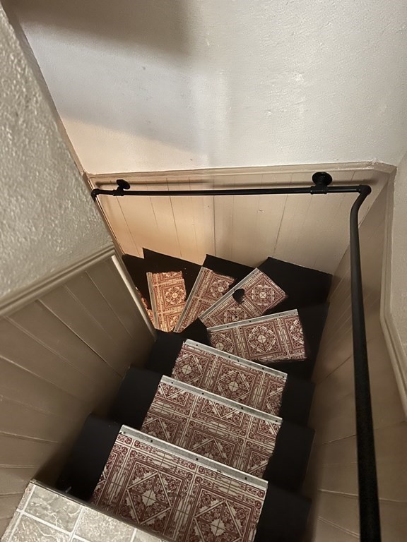 63 Brow Street Fall River, MA 02721 - Photo 10 of 35 a view of walk in closet with clothes and shoes