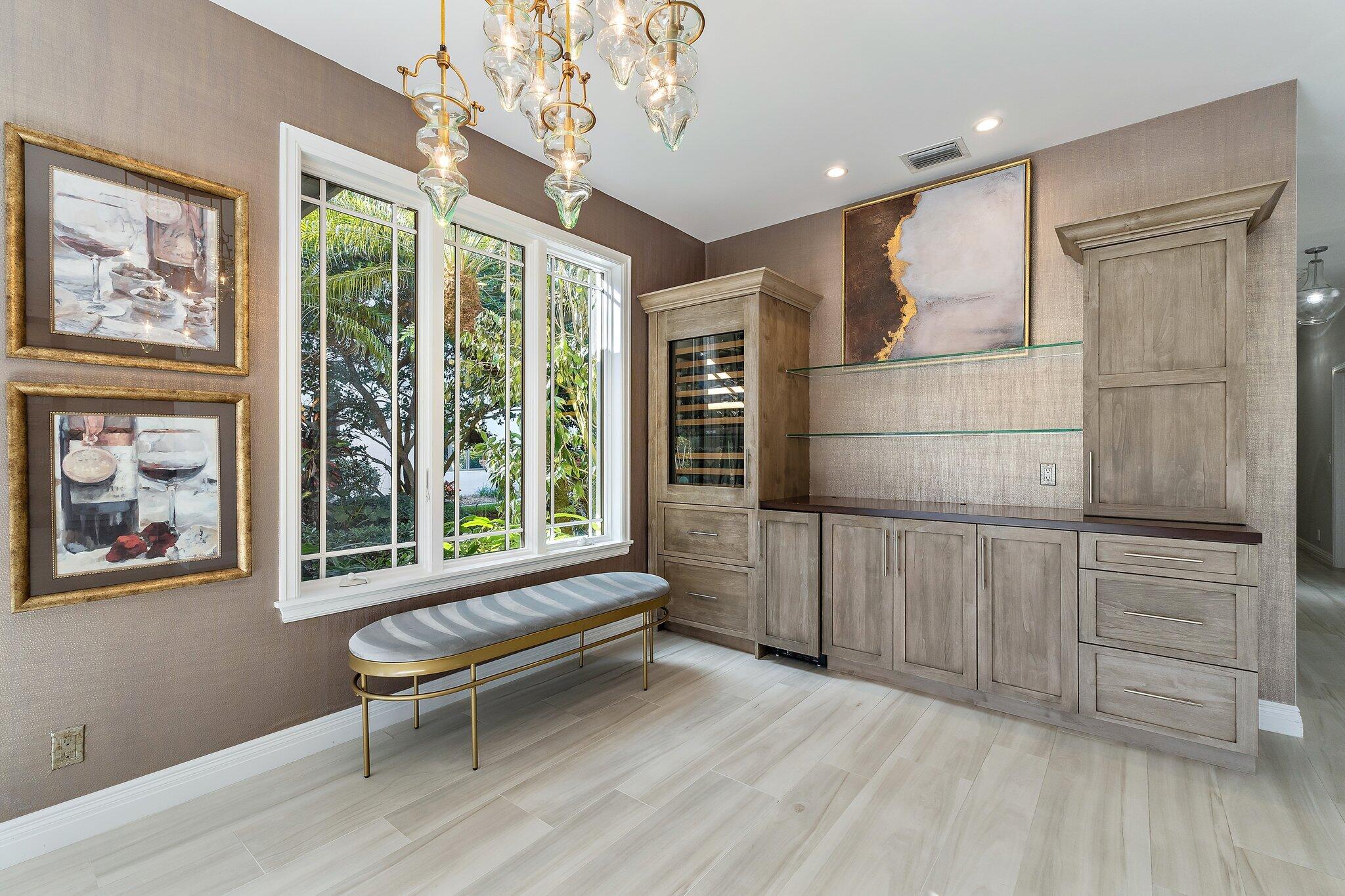 12092 Southeast Birkdale Run Jupiter, FL 33469 - Photo 18 of 53 a view of a livingroom with furniture window and wooden floor