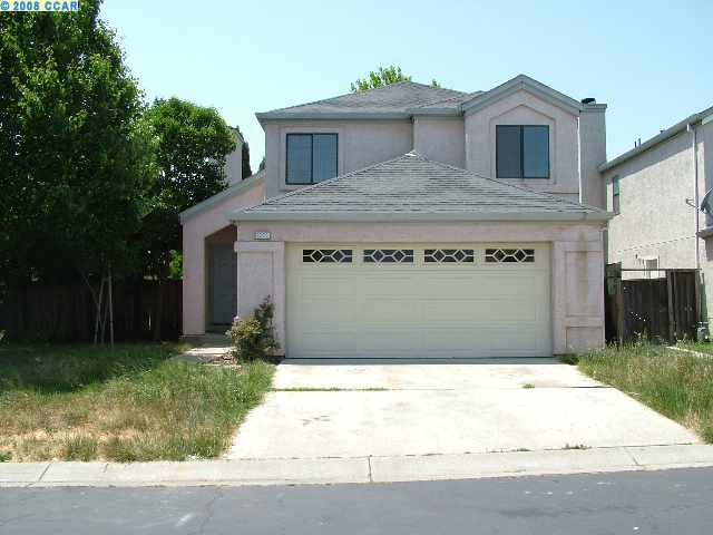 1205 Quail Valley Run Oakley, CA 94561 - Photo 1 of 1 a front view of a house with a yard and garage