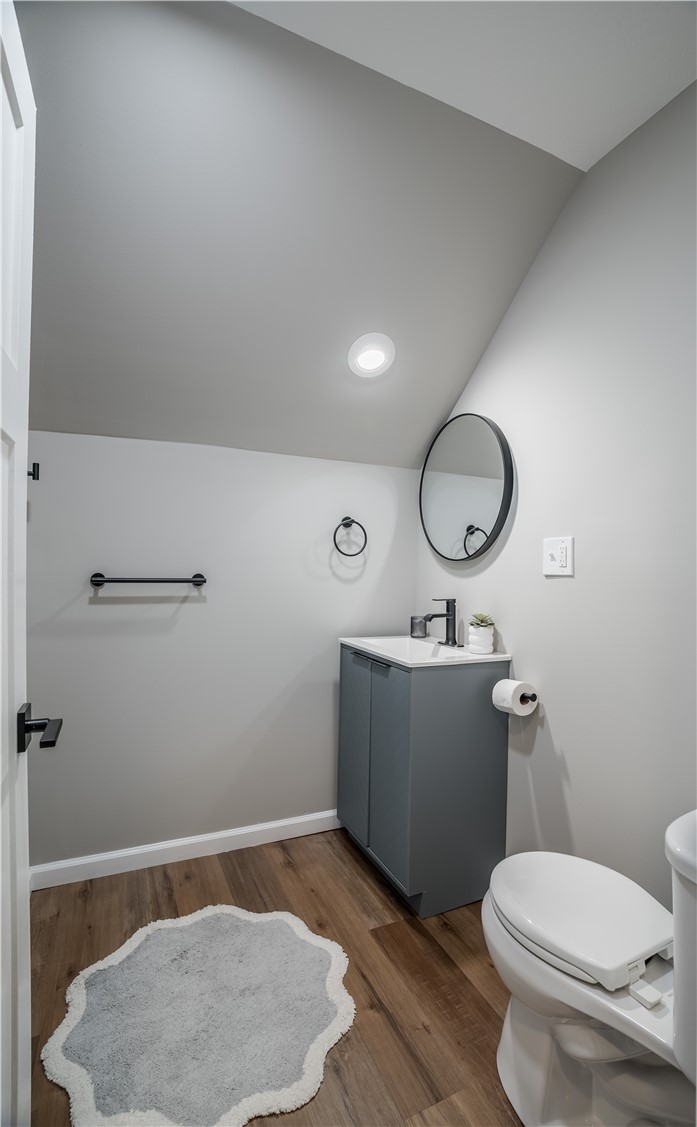 8240 Looney Road Piqua, OH 45356 - Photo 27 of 49 This thoughtfully designed powder room offers both style and practicality.