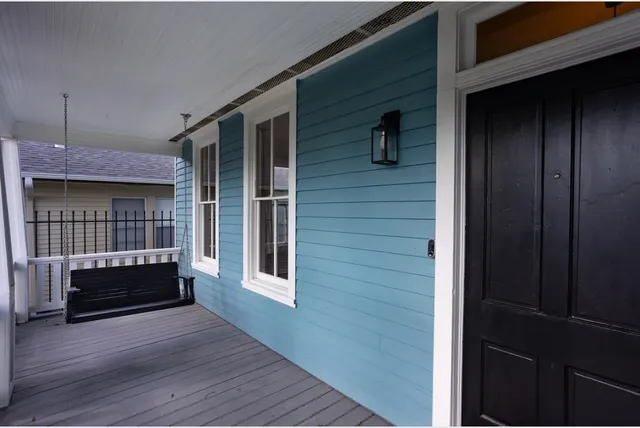 a front view of a house with a garage