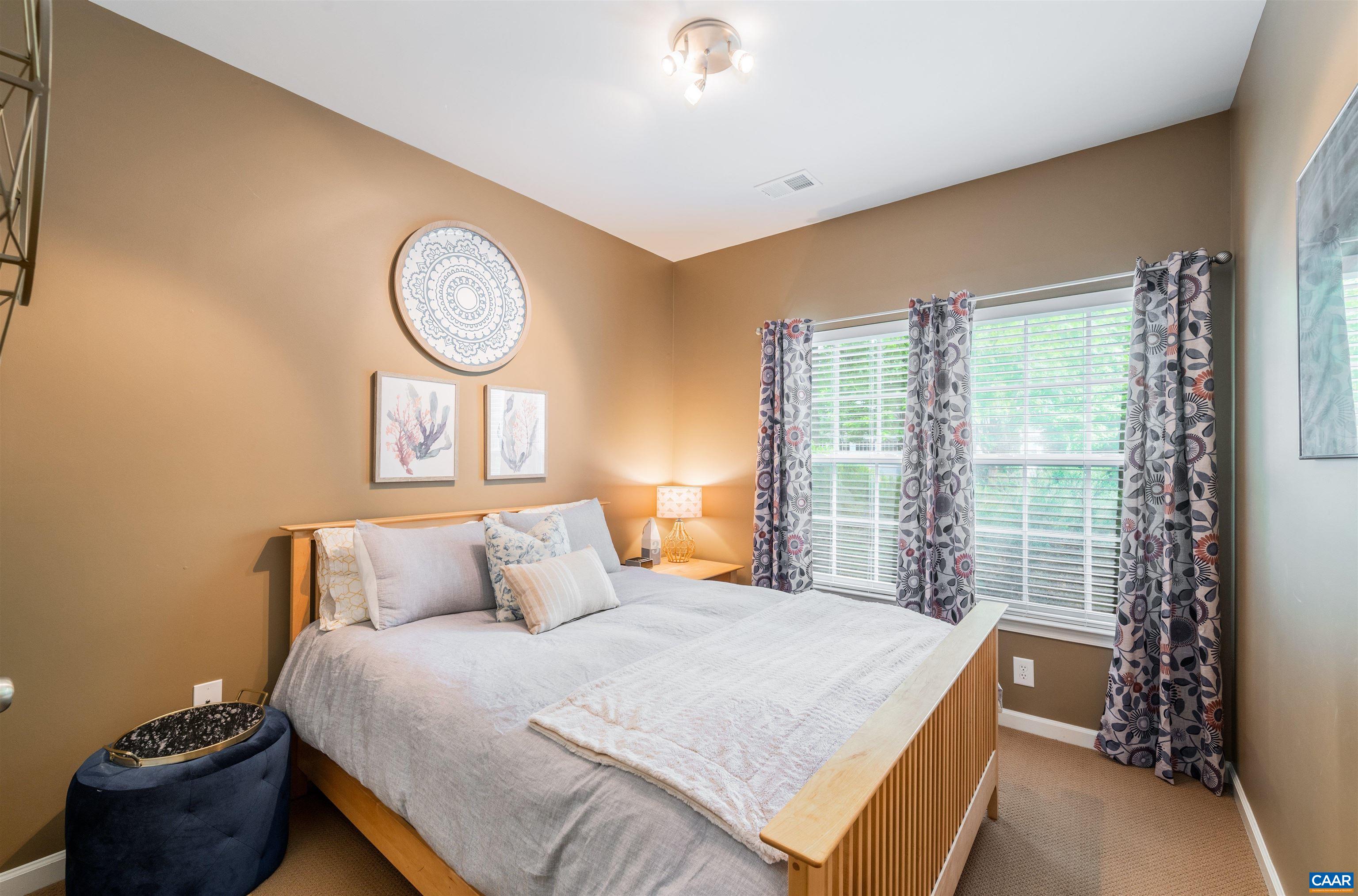 719 Rainier Road Charlottesville, VA 22903 - Photo 12 of 41 a bedroom with a bed and a window