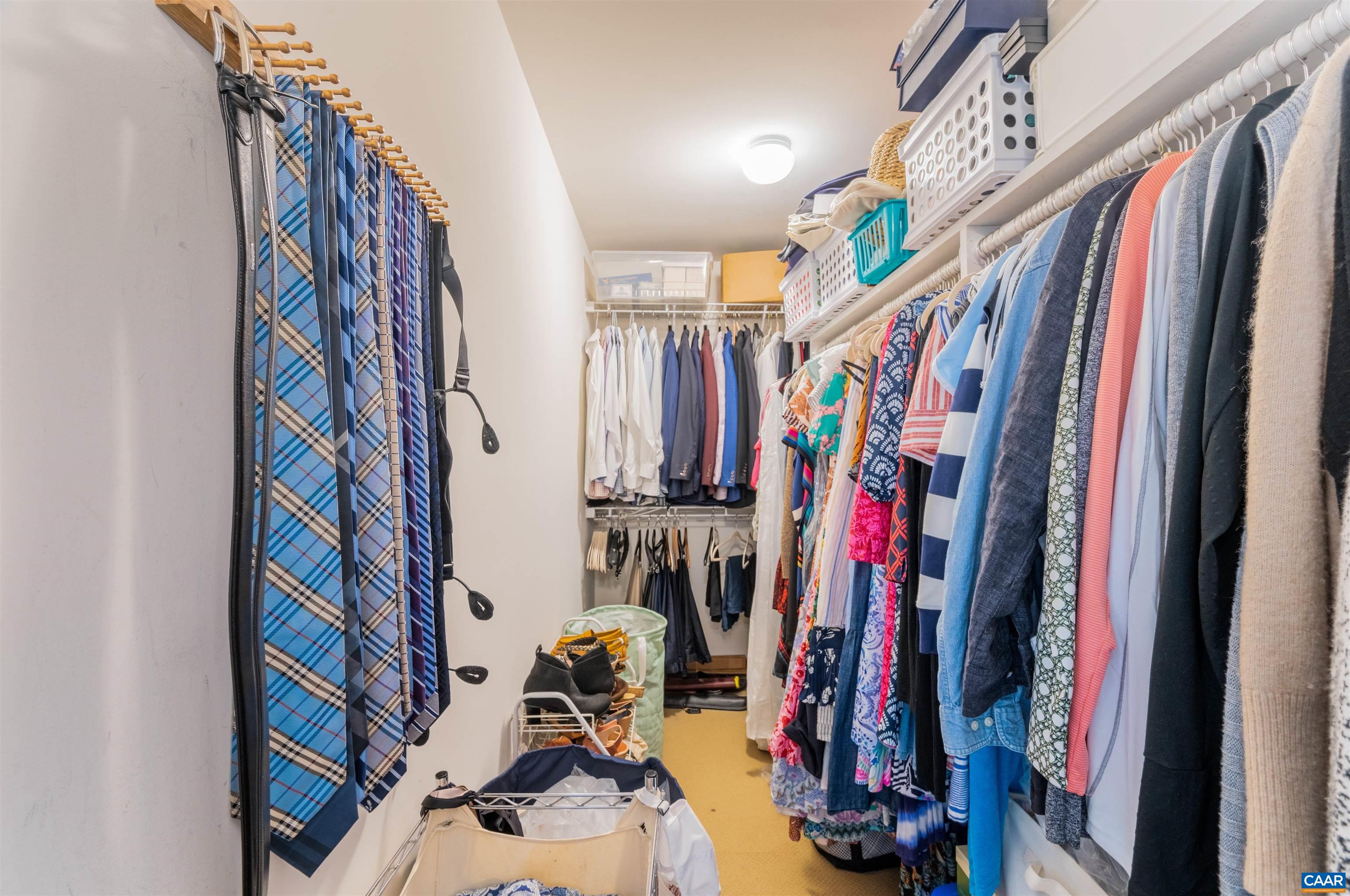 719 Rainier Road Charlottesville, VA 22903 - Photo 33 of 41 a view of walk in closet with clothes