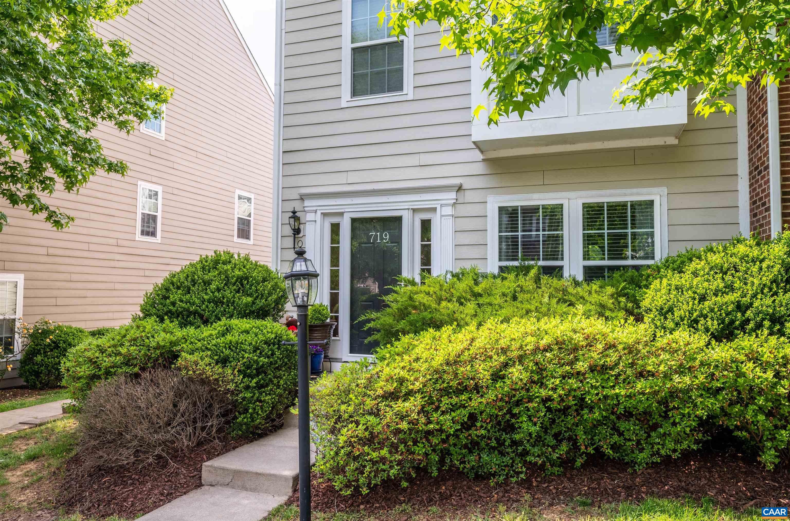 719 Rainier Road Charlottesville, VA 22903 - Photo 39 of 41 a view of a house with potted plants and a tree
