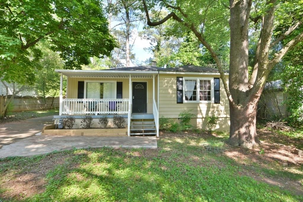 1354 Alverado Way Decatur, GA 30032 - Photo 1 of 1 front view of a house with a yard