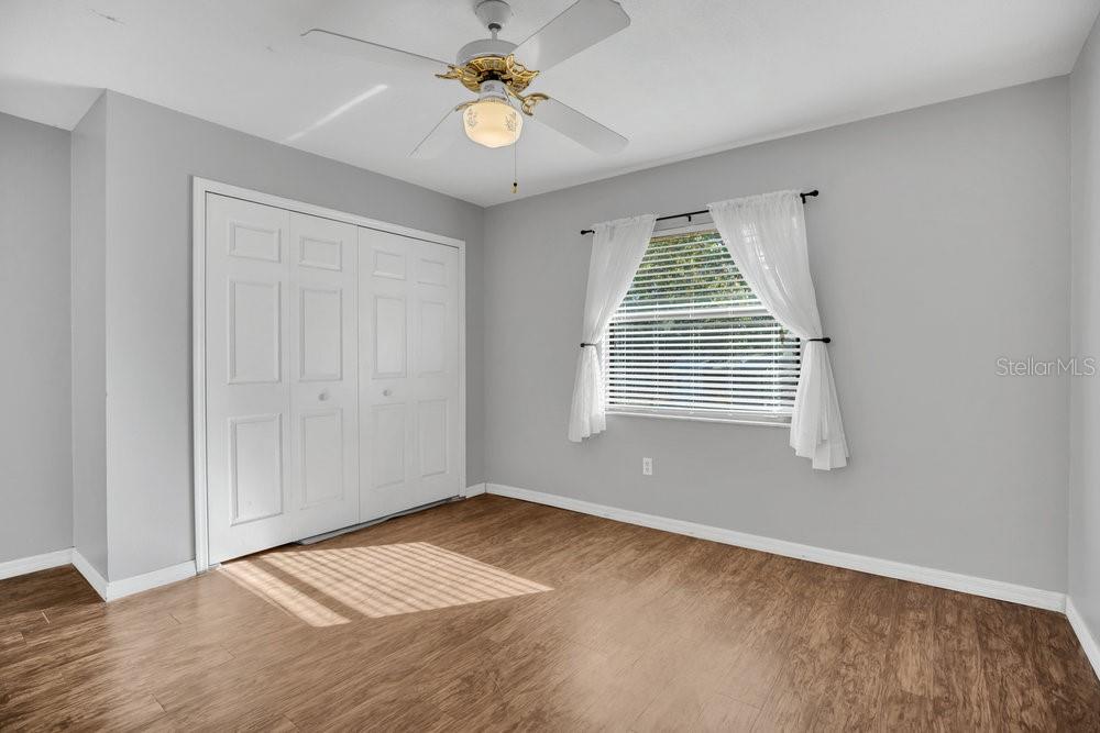 90 Sundown Road DeBary, FL 32713 - Photo 21 of 36 a view of an empty room with a window