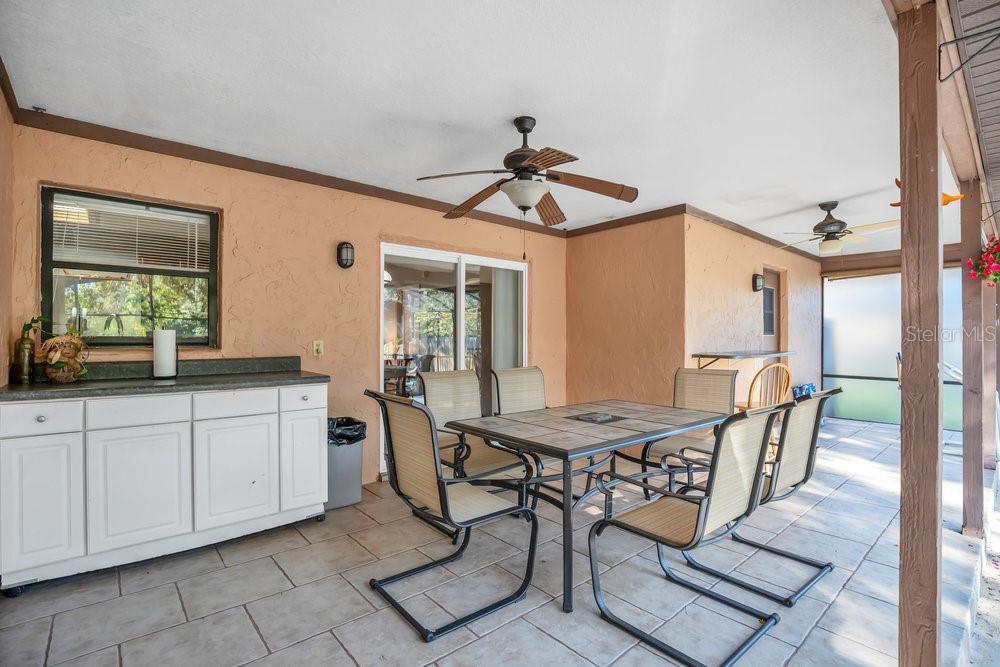 90 Sundown Road DeBary, FL 32713 - Photo 23 of 36 a dining room with furniture and window