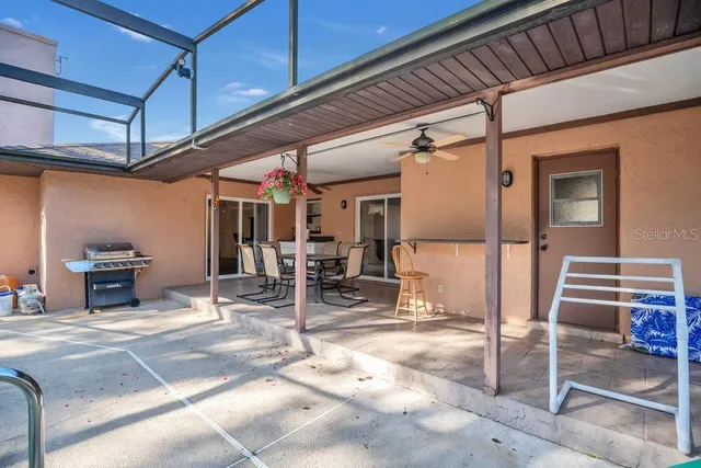 a view of a garage with wooden floor