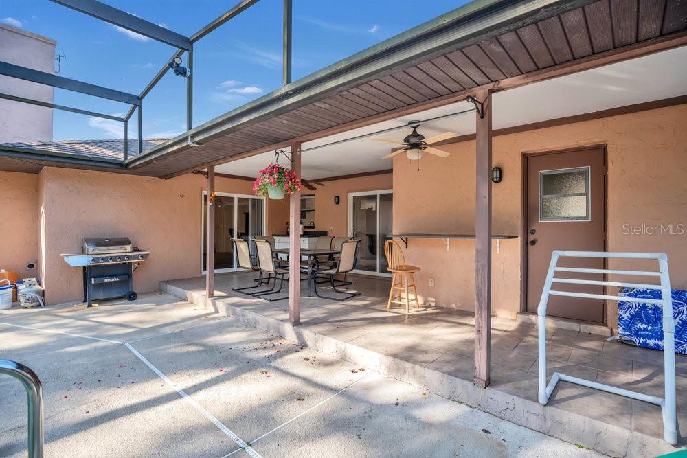 90 Sundown Road DeBary, FL 32713 - Photo 24 of 36 a view of a garage with wooden floor
