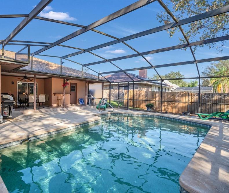 90 Sundown Road DeBary, FL 32713 - Photo 27 of 36 a view of a backyard with a small cabin