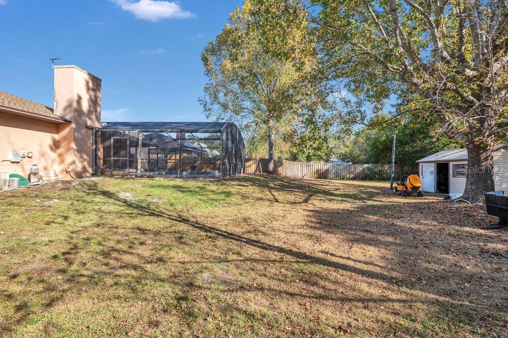 90 Sundown Road DeBary, FL 32713 - Photo 29 of 36 a view of a house with a yard