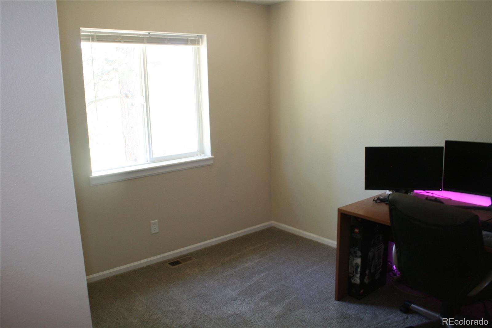 238 Taylor Street Bailey, CO 80421 - Photo 21 of 23 a room with a window and a table