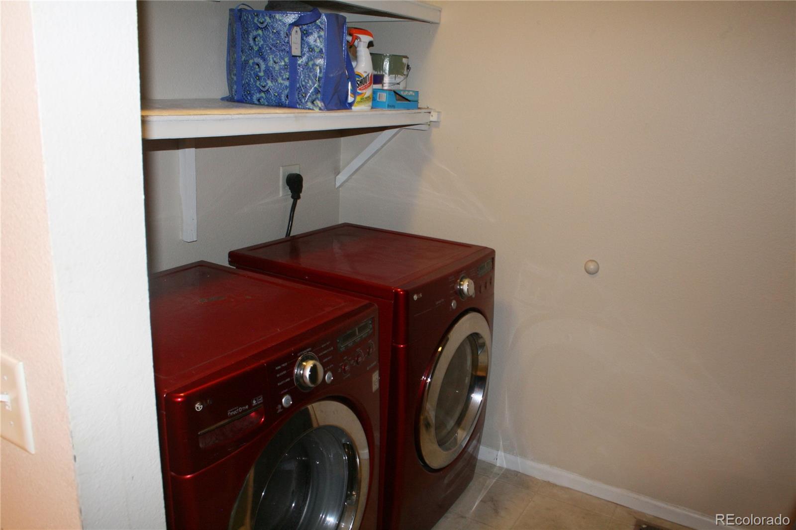238 Taylor Street Bailey, CO 80421 - Photo 22 of 23 a utility room with dryer and washer