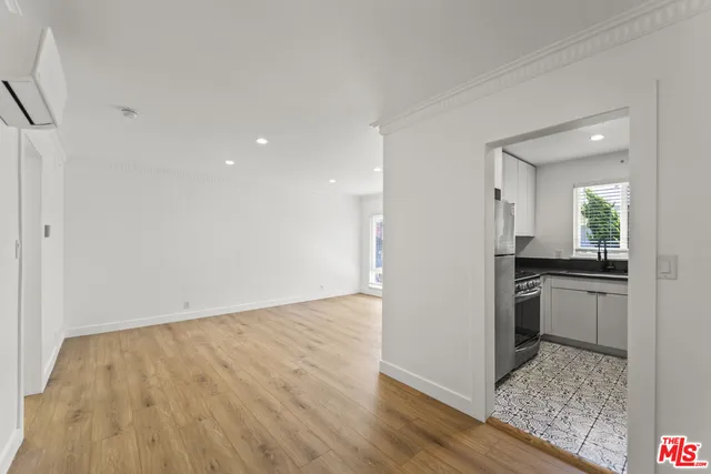 a view of a kitchen with a sink and dishwasher