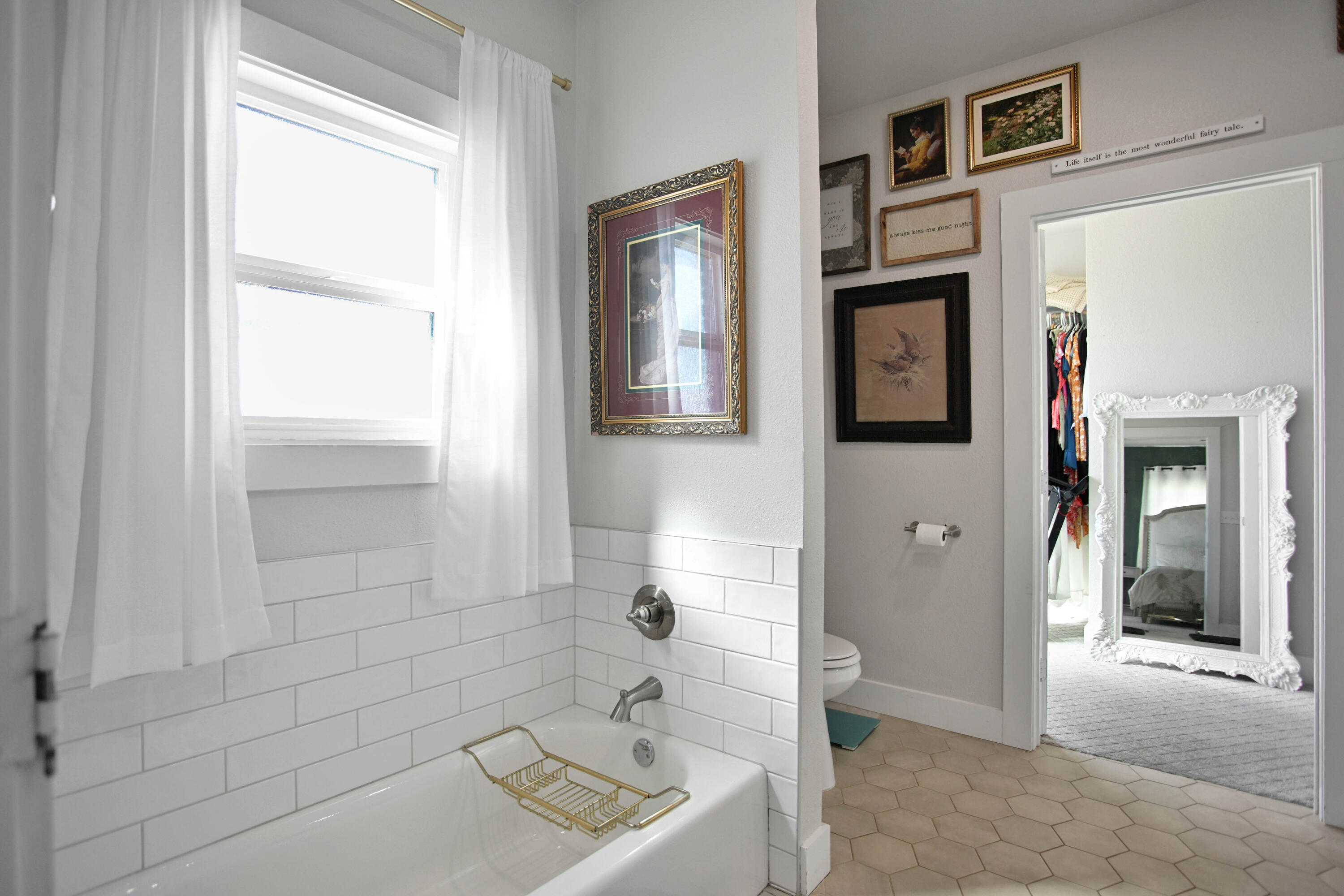 3091 County Road 3 Slaton, TX 79364 - Photo 21 of 41 a bathroom with a toilet a sink and shower
