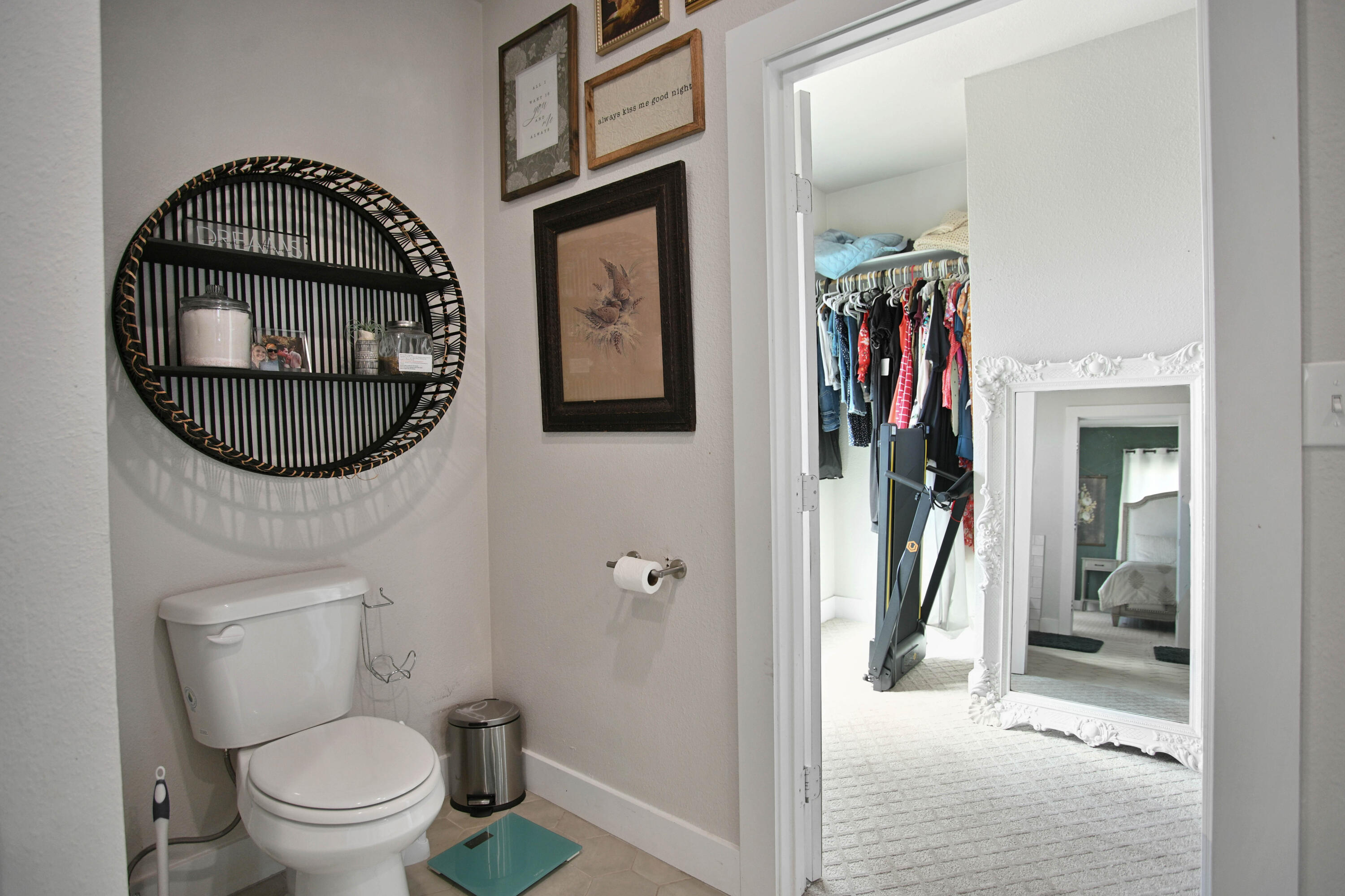 3091 County Road 3 Slaton, TX 79364 - Photo 22 of 41 a bathroom with a toilet a sink and a mirror