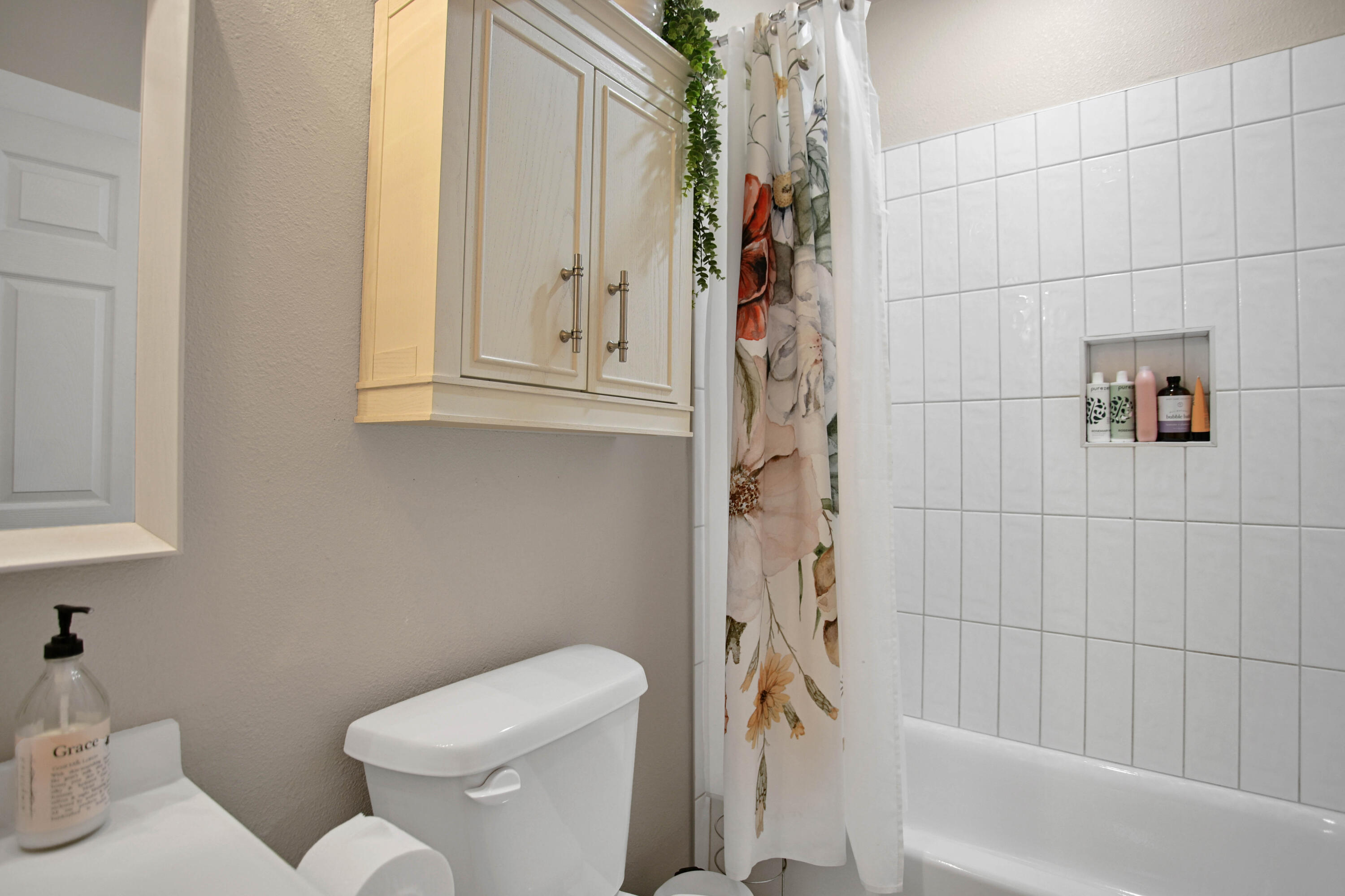3091 County Road 3 Slaton, TX 79364 - Photo 26 of 41 a bathroom with a toilet and a shower