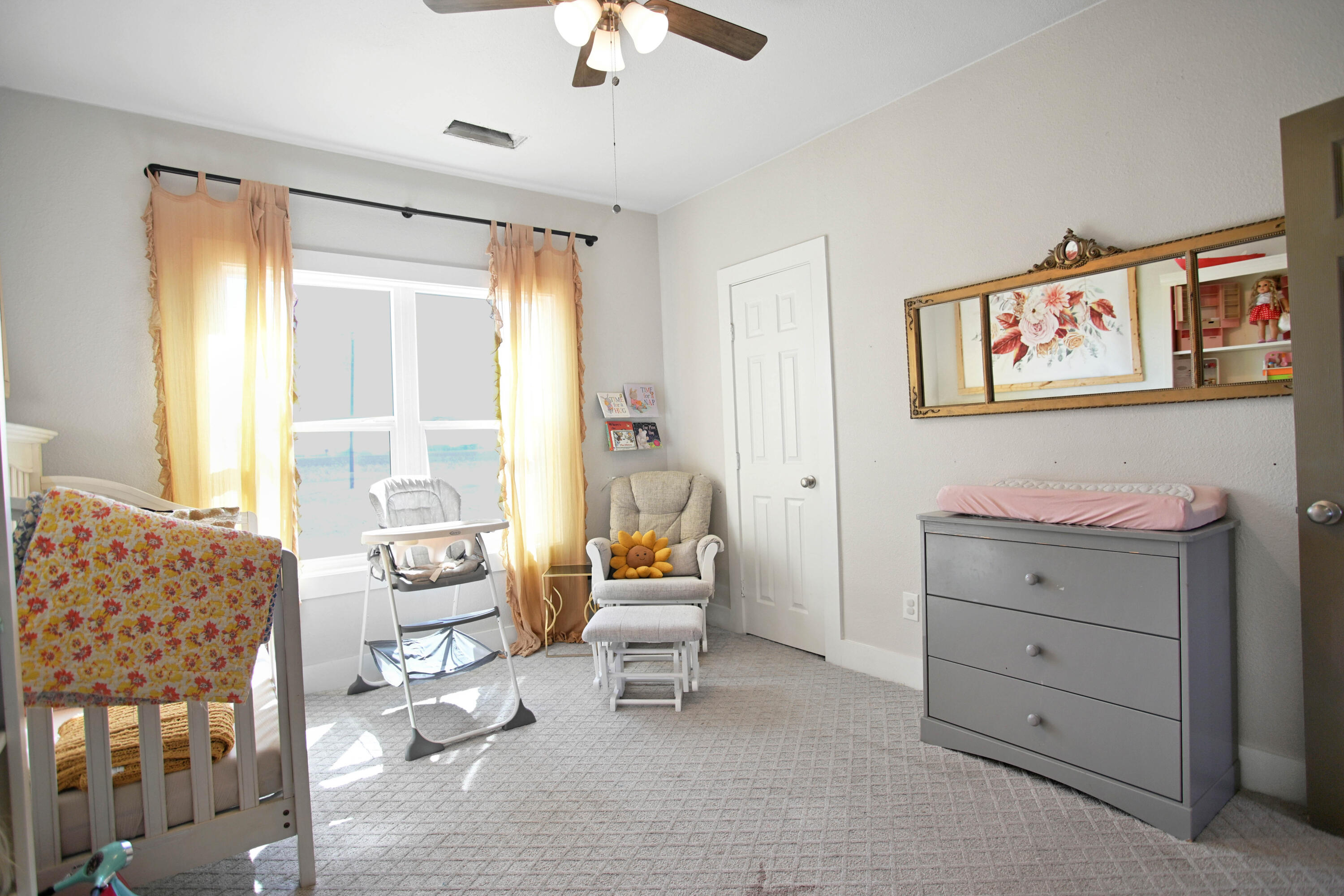 3091 County Road 3 Slaton, TX 79364 - Photo 29 of 41 a bedroom with furniture and a window