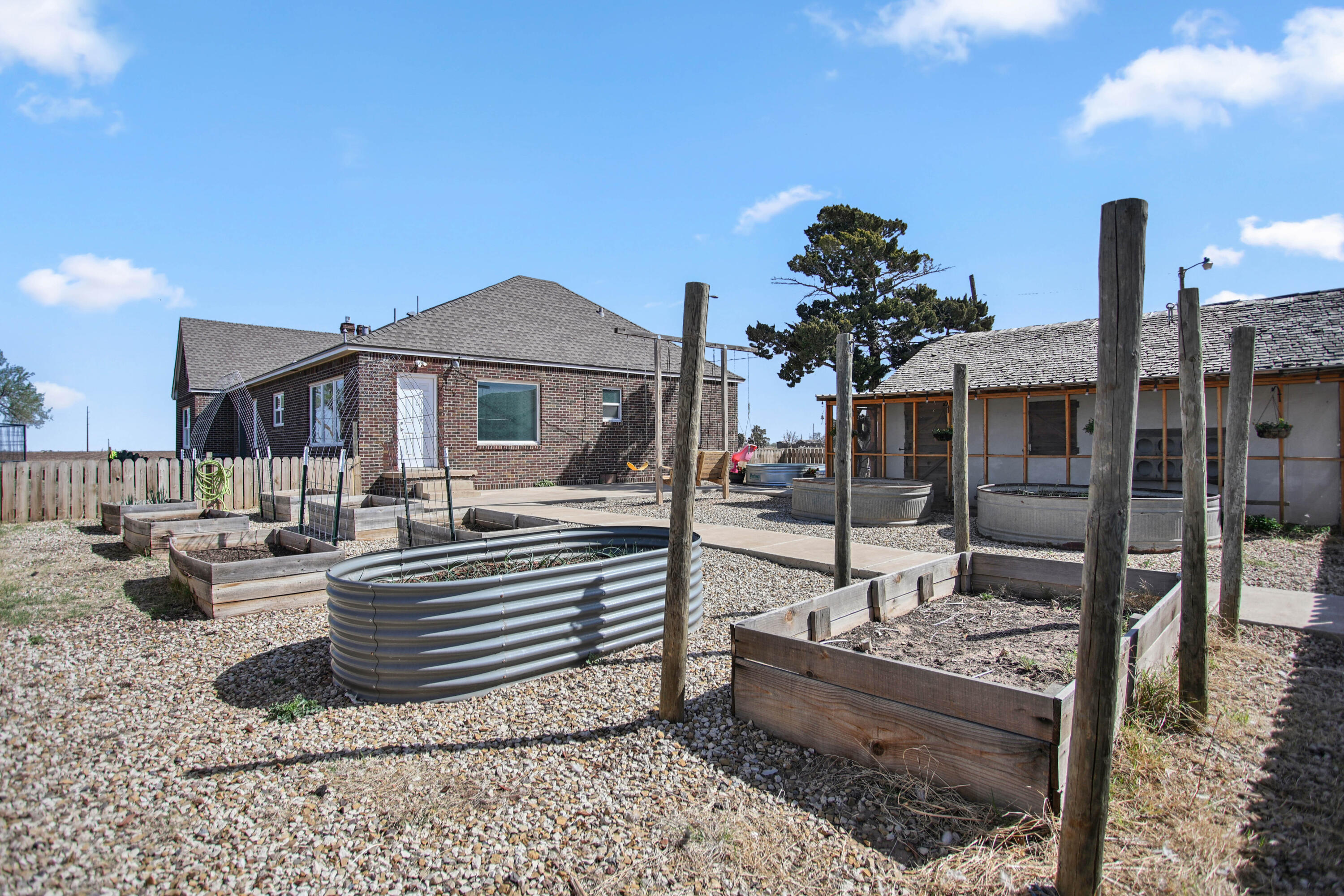 3091 County Road 3 Slaton, TX 79364 - Photo 37 of 41 a view of a terrace with sitting area