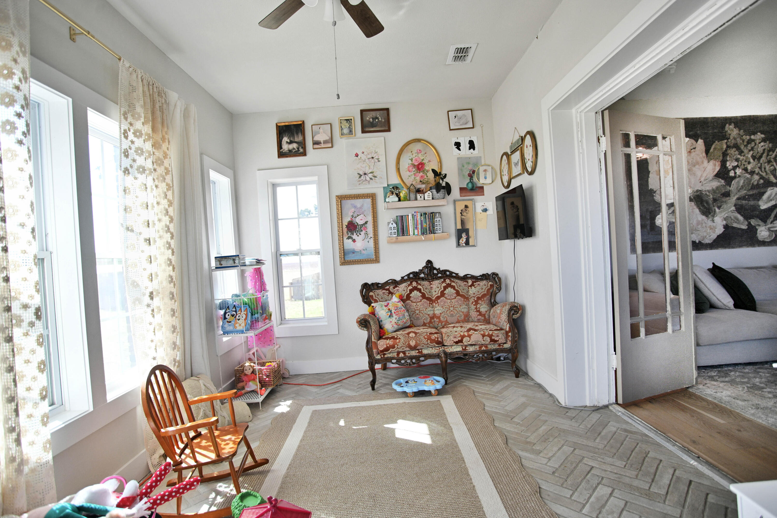 3091 County Road 3 Slaton, TX 79364 - Photo 9 of 41 a living room with furniture and a window