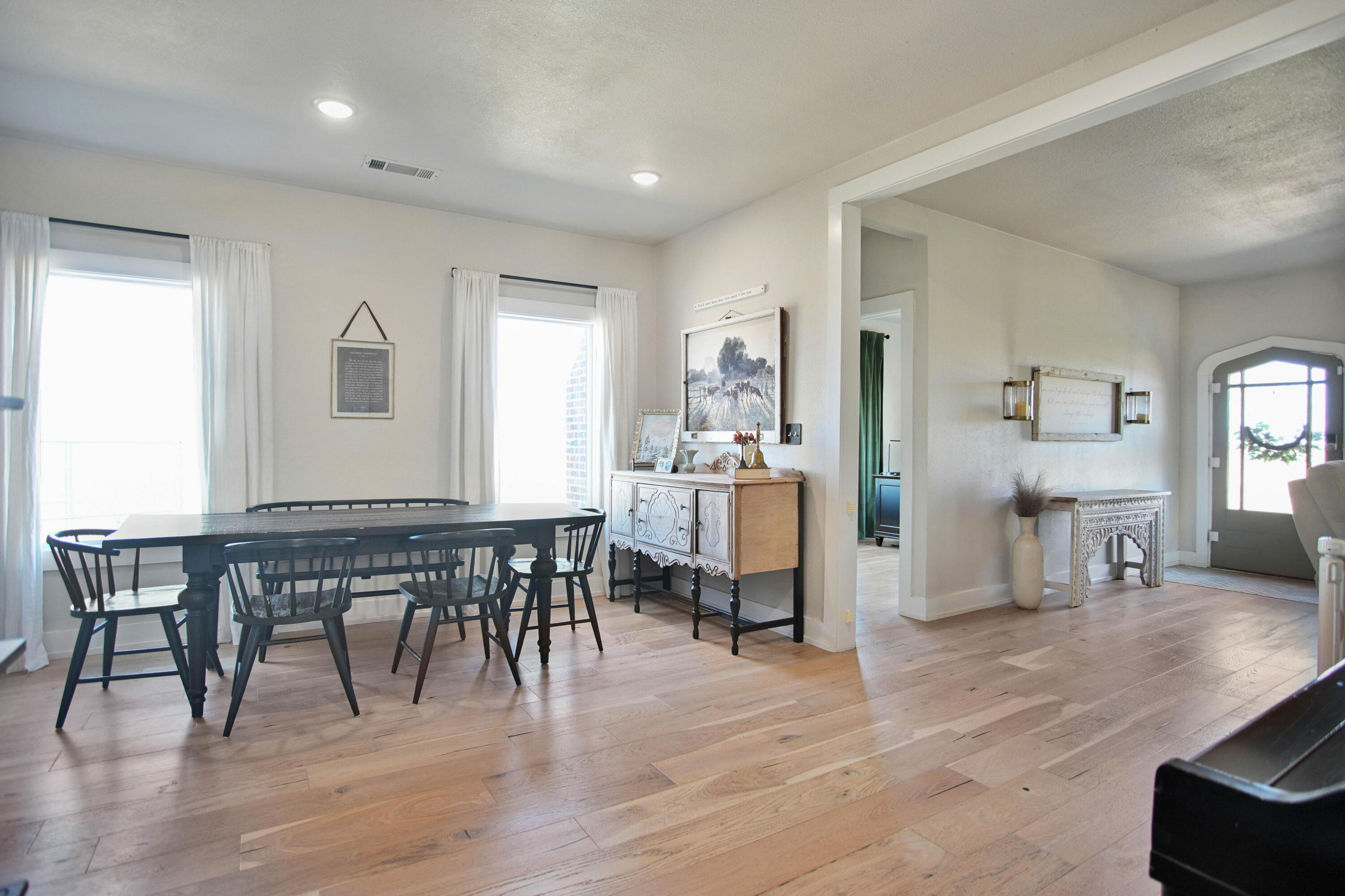 3091 County Road 3 Slaton, TX 79364 - Photo 10 of 41 a view of a a dining room with furniture window and wooden floor