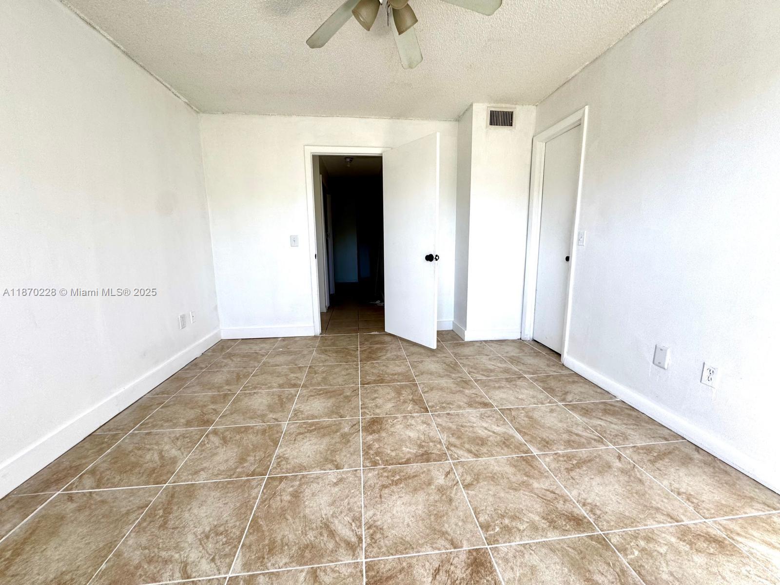 4341 West McNab Road, Unit 27 Pompano Beach, FL 33069 - Photo 31 of 50 a view of an empty room