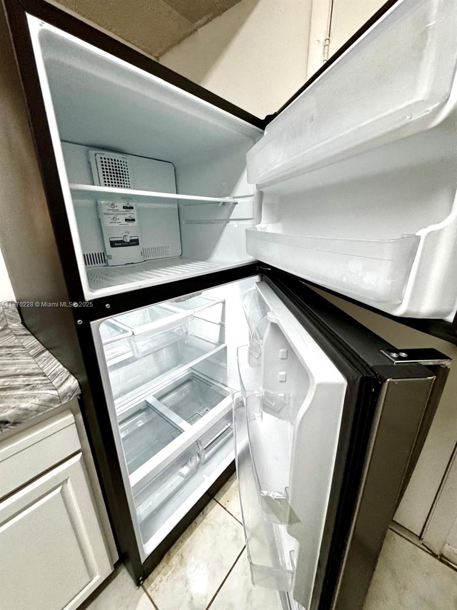 4341 West McNab Road, Unit 27 Pompano Beach, FL 33069 - Photo 38 of 50 a view of washer and dryer