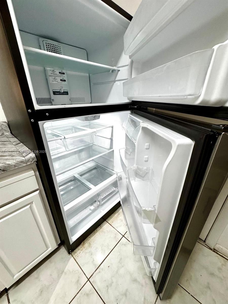 4341 West McNab Road, Unit 27 Pompano Beach, FL 33069 - Photo 42 of 50 a view of washer and dryer